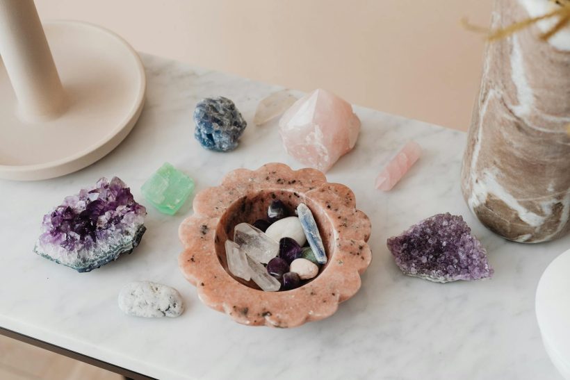 Assorted Crystals over a Marble Top Table